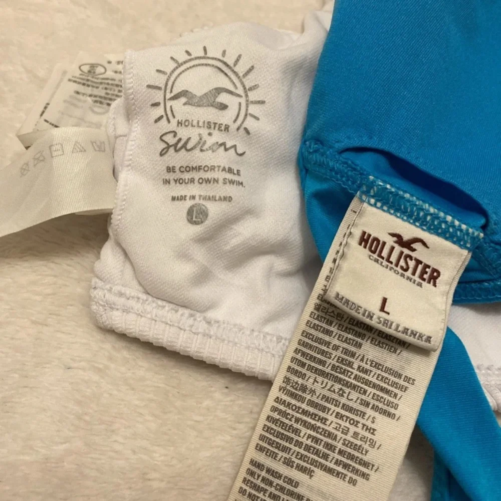 Hollister White and Blue Eyelet Ruffle Bikini Set